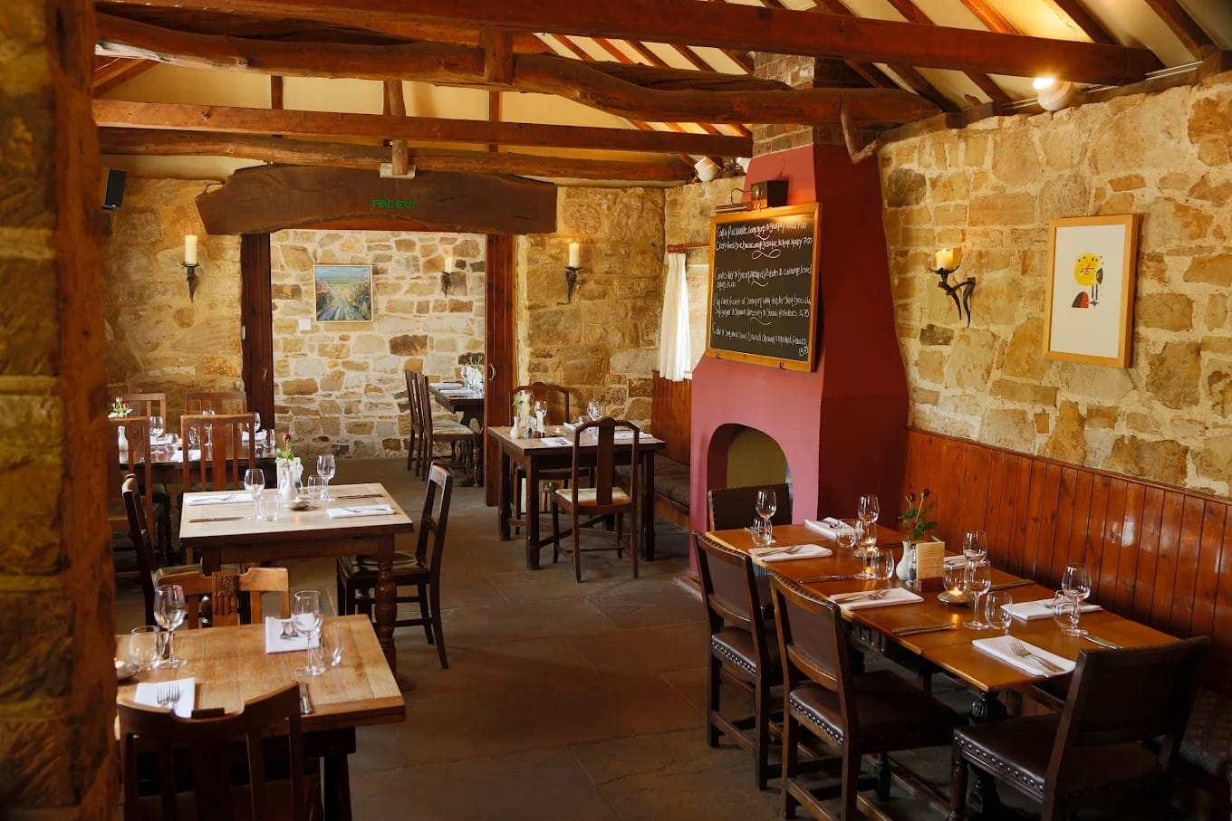Dining room inside The Coach and Horses gastro pub near The Nest Danehill