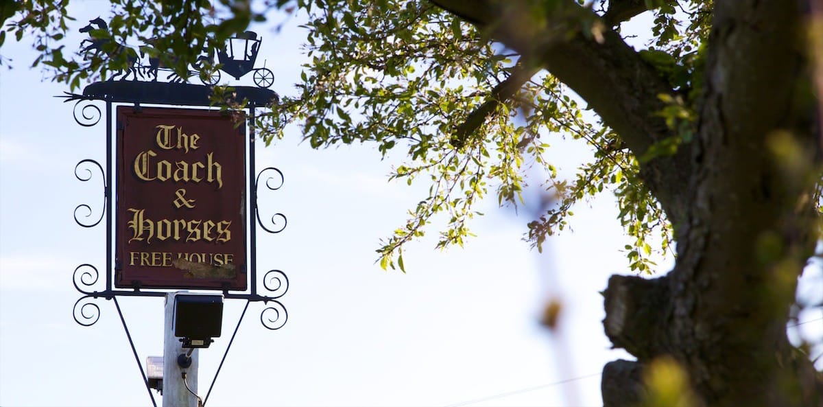 Self-Catering Holiday Cottage Accommodation In Sussex The Coach and Horses Free House pub sign in Danehill East Sussex