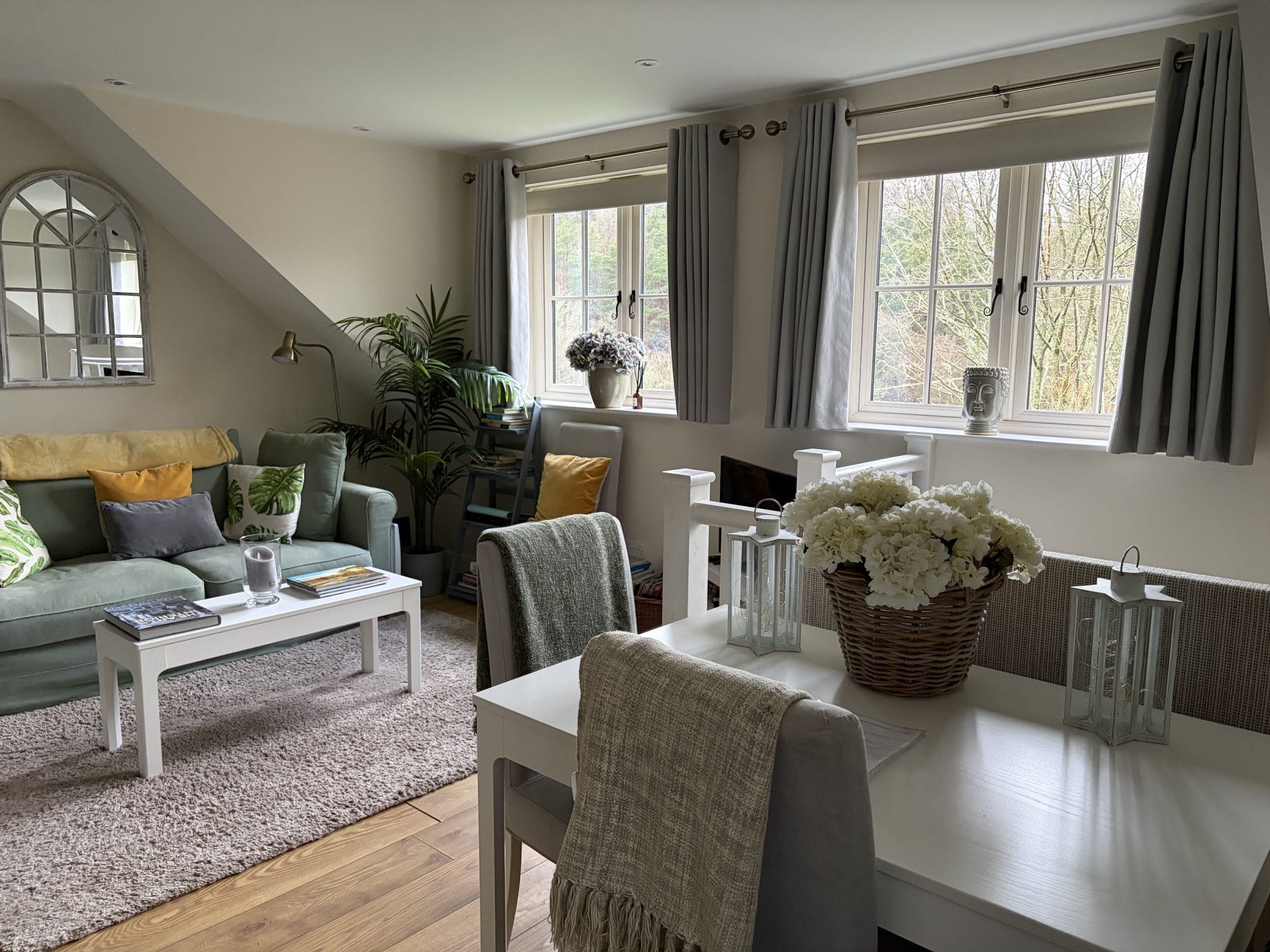 Self-Catering Holiday Cottage Accommodation In Sussex Bright living and dining area at The Nest Danehill with woodland views