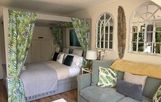 Romantic bedroom and lounge area inside The Nest Danehill